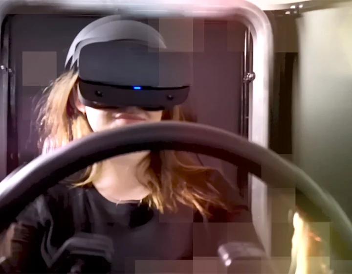 Woman using VR headset, highlighting creative marketing services and digital advertising by a Winnipeg agency.