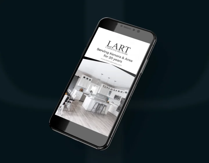Smartphone displaying a website design by a creative marketing agency in Winnipeg, specializing in video and graphic services.